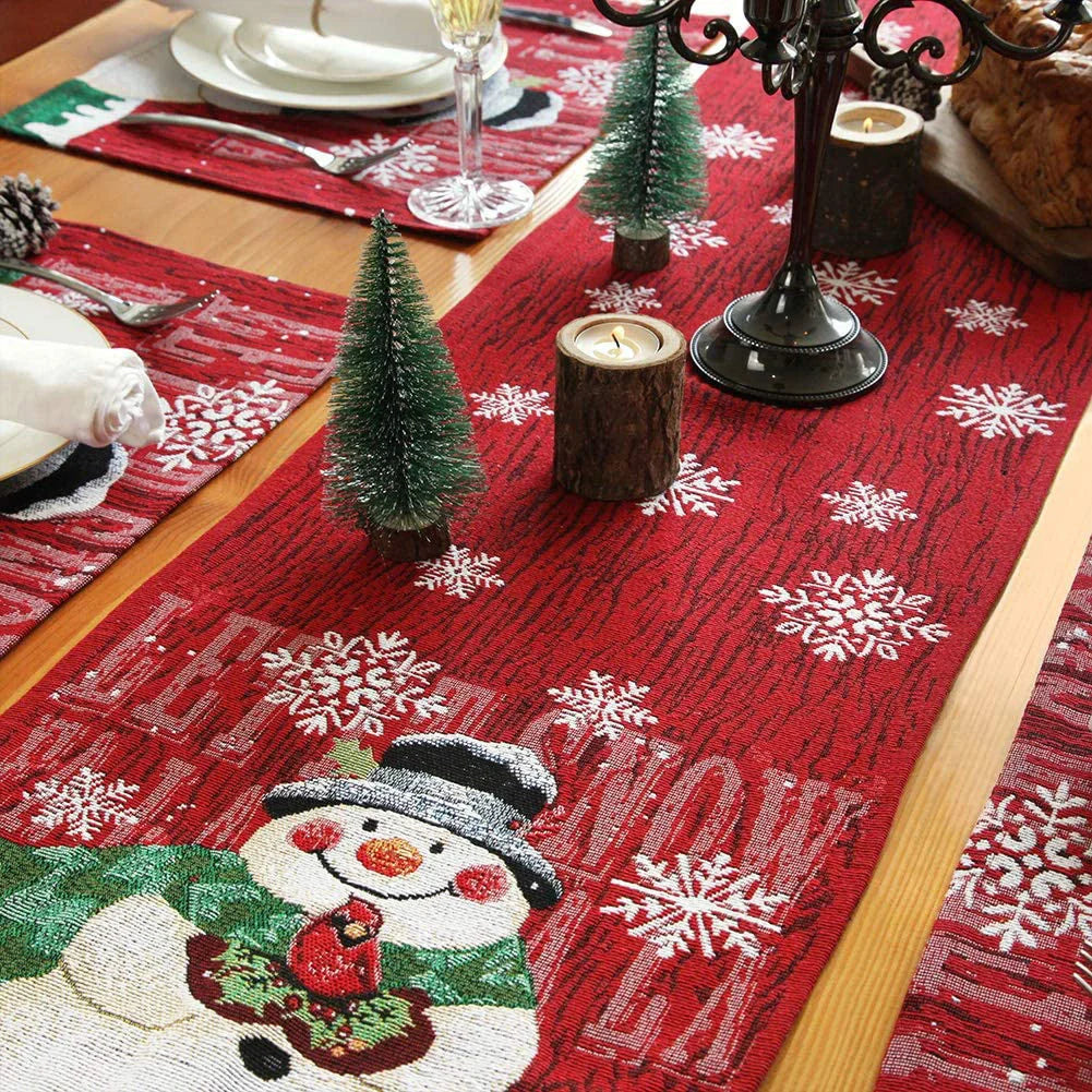Christmas tablecloth with snowman and snowflake design in red