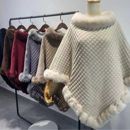 Luxurious rabbit fur wrap shawl in various colours, featuring a soft, cosy collar and a flattering cropped fit for a chic, polished look.