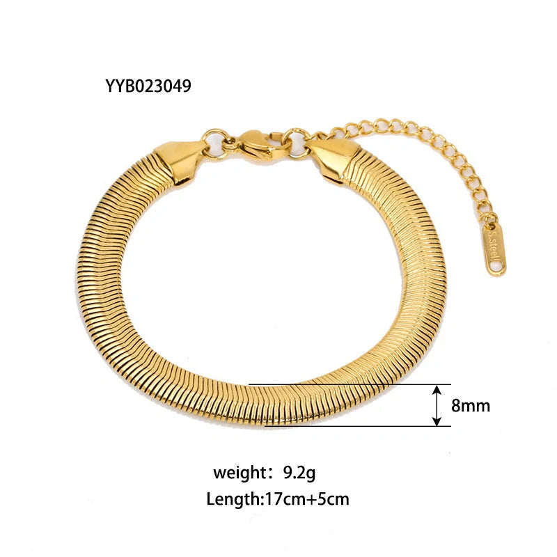 Stainless steel bracelet with real gold treatment in various colours, featuring geometry shapes and ring elements