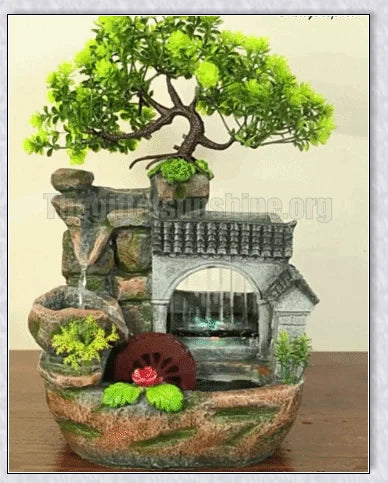 Premium polyresin indoor tabletop waterfall fountain with lifelike design and soothing cascading water sounds for relaxation and stress relief