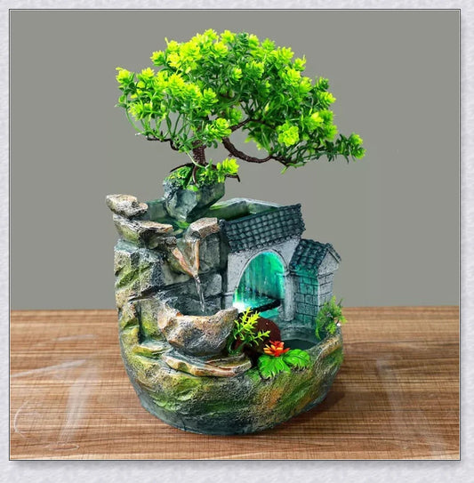 Premium polyresin indoor tabletop waterfall fountain with lifelike design and soothing cascading water sounds for relaxation and stress relief