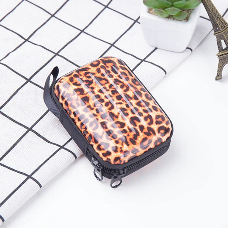 Tinplate coin purse with anime-inspired cartoon graphics, available in various stylish designs