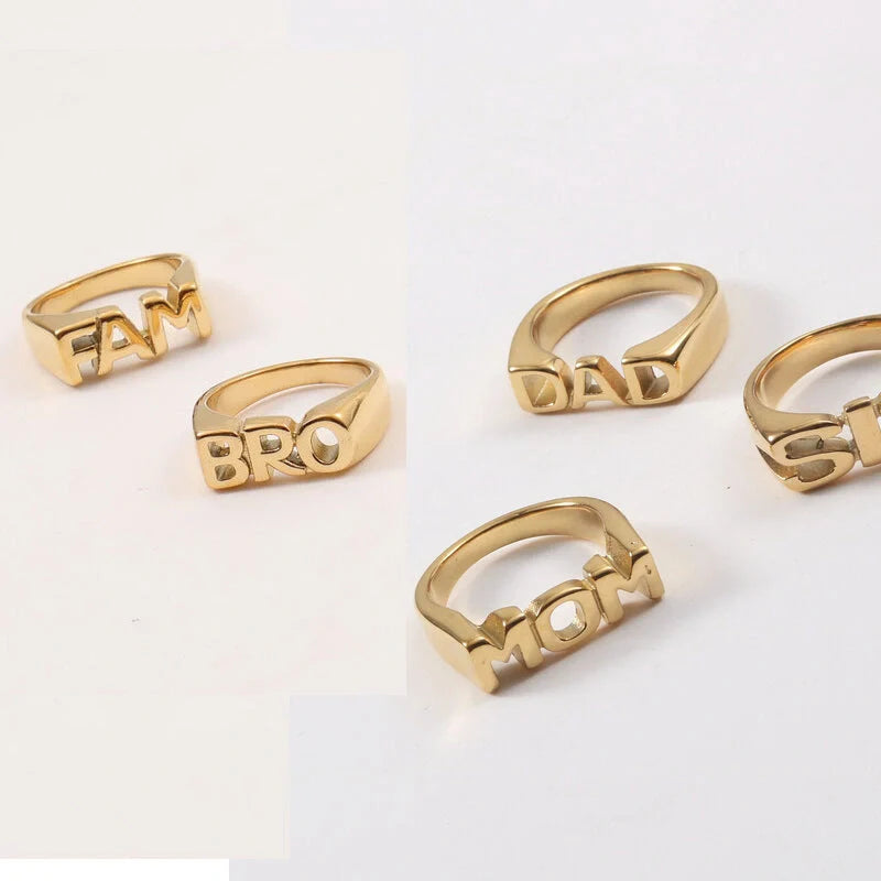 Women's Letter Seal Titanium Steel Plating 18K Gold Ring in various gold tones