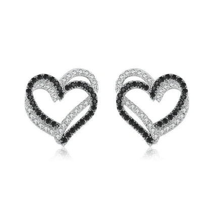 Stylish copper heart-shaped earrings with a double buckle design, perfect for adding a touch of elegance to any outfit.