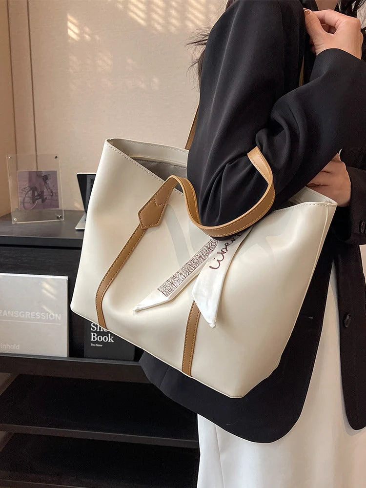 Stylish large capacity tote bag in various colours, perfect for fashion and functionality