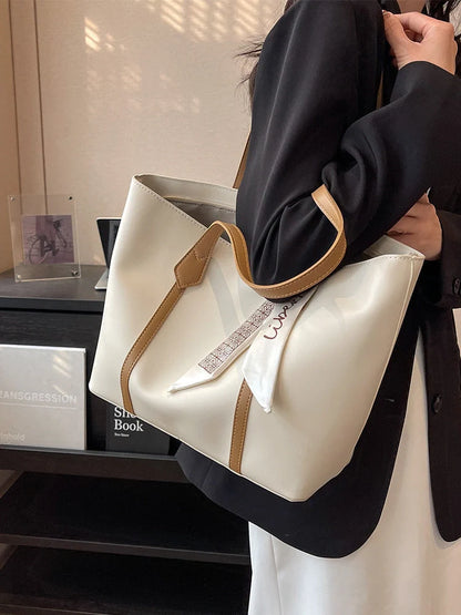 Stylish large capacity tote bag in various colours, perfect for fashion and functionality