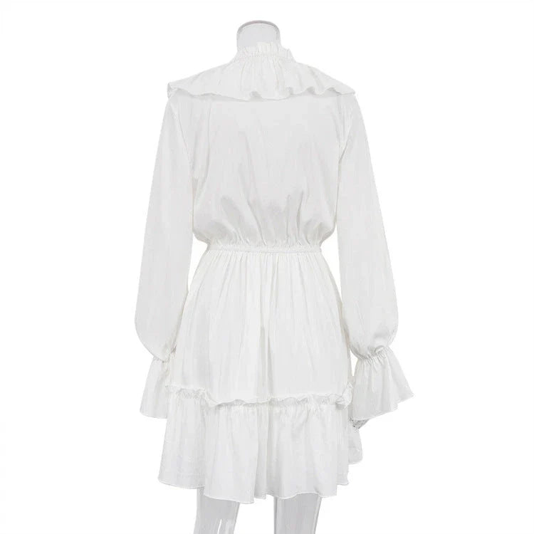 Stylish Y2K-inspired viscose dress with v-neck and flared sleeves, available in a range of vibrant colors