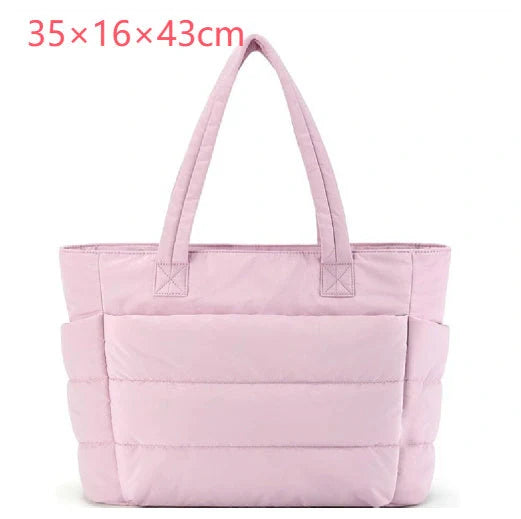Premium cotton handbag with spacious design, secure zip-top closure, and thoughtful interior organisation for daily use