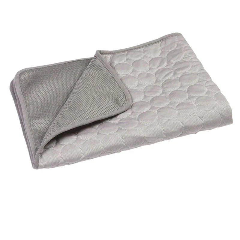 A cooling mat for pets in various sizes and colors, designed to provide refreshing comfort and temperature regulation.