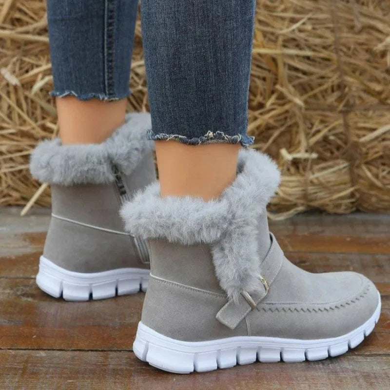 Cozy plush ankle boots in various colors with buckle detail and soft artificial fur lining