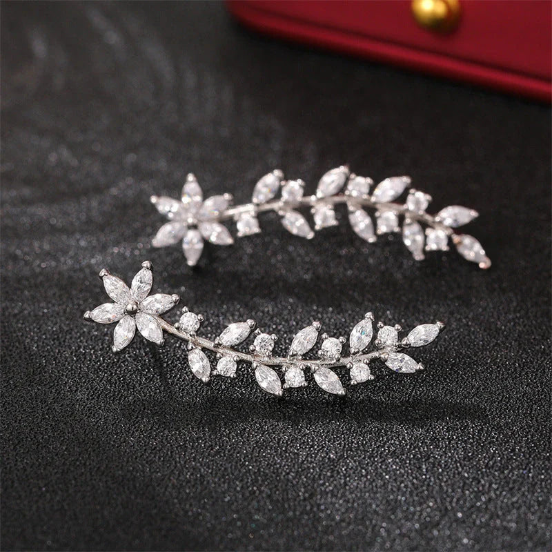 Stylish diamond flower earrings for women in white gold, gold, and rose gold