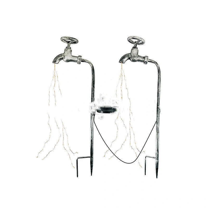 Solar-powered garden lamp with water faucet design for outdoor decoration
