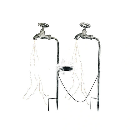 Solar-powered garden lamp with water faucet design for outdoor decoration