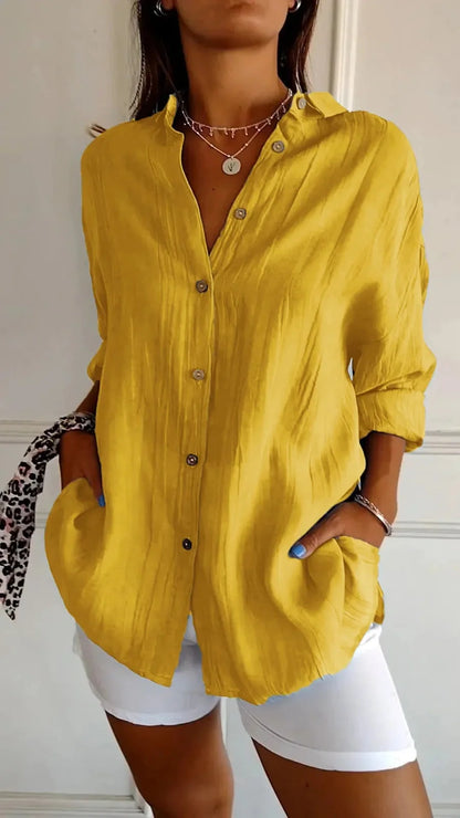 A stylish long-sleeved shirt with a pleated design, available in a variety of colours to suit any occasion.