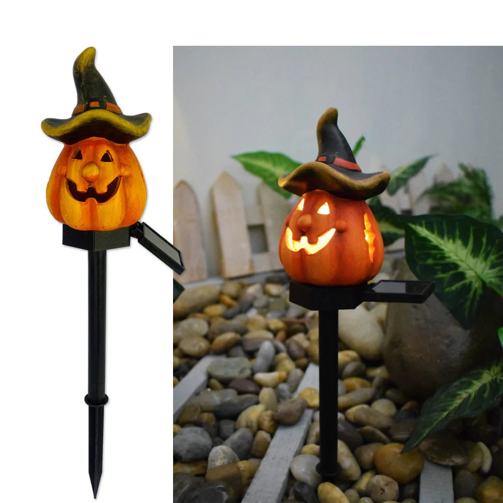 Solar-powered Halloween pumpkin lanterns in garden setting