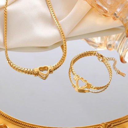 Personalised love chain necklace and bracelet set in titanium steel with heart-shaped design
