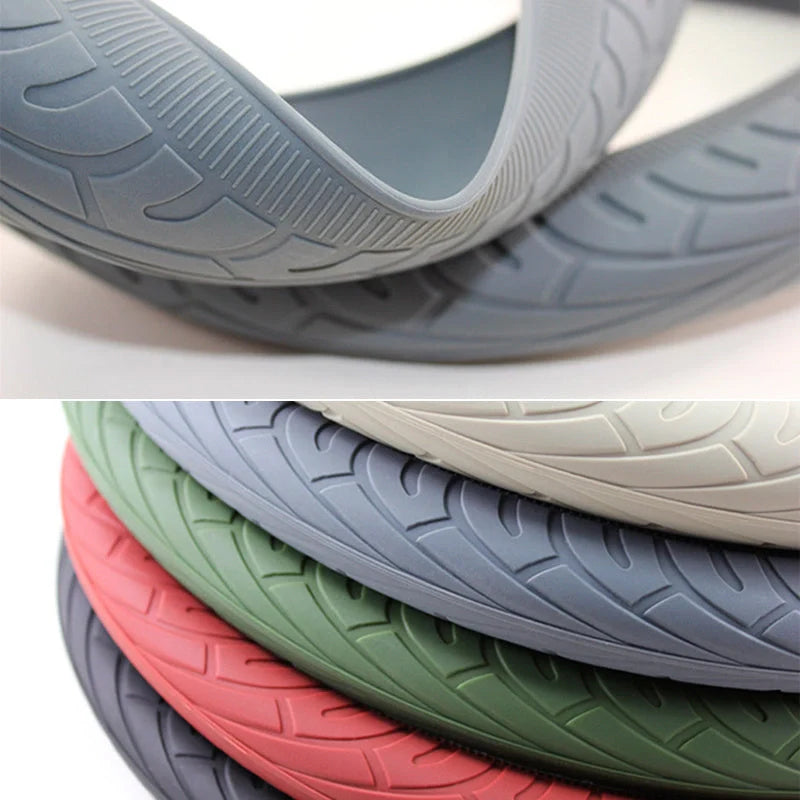 Anjiemei Silicone Steering Wheel Cover in various colours on a car steering wheel