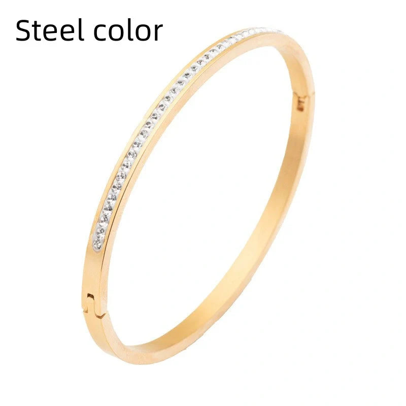Single row stainless steel bracelet with diamond opening in gold, rose gold, or steel colour