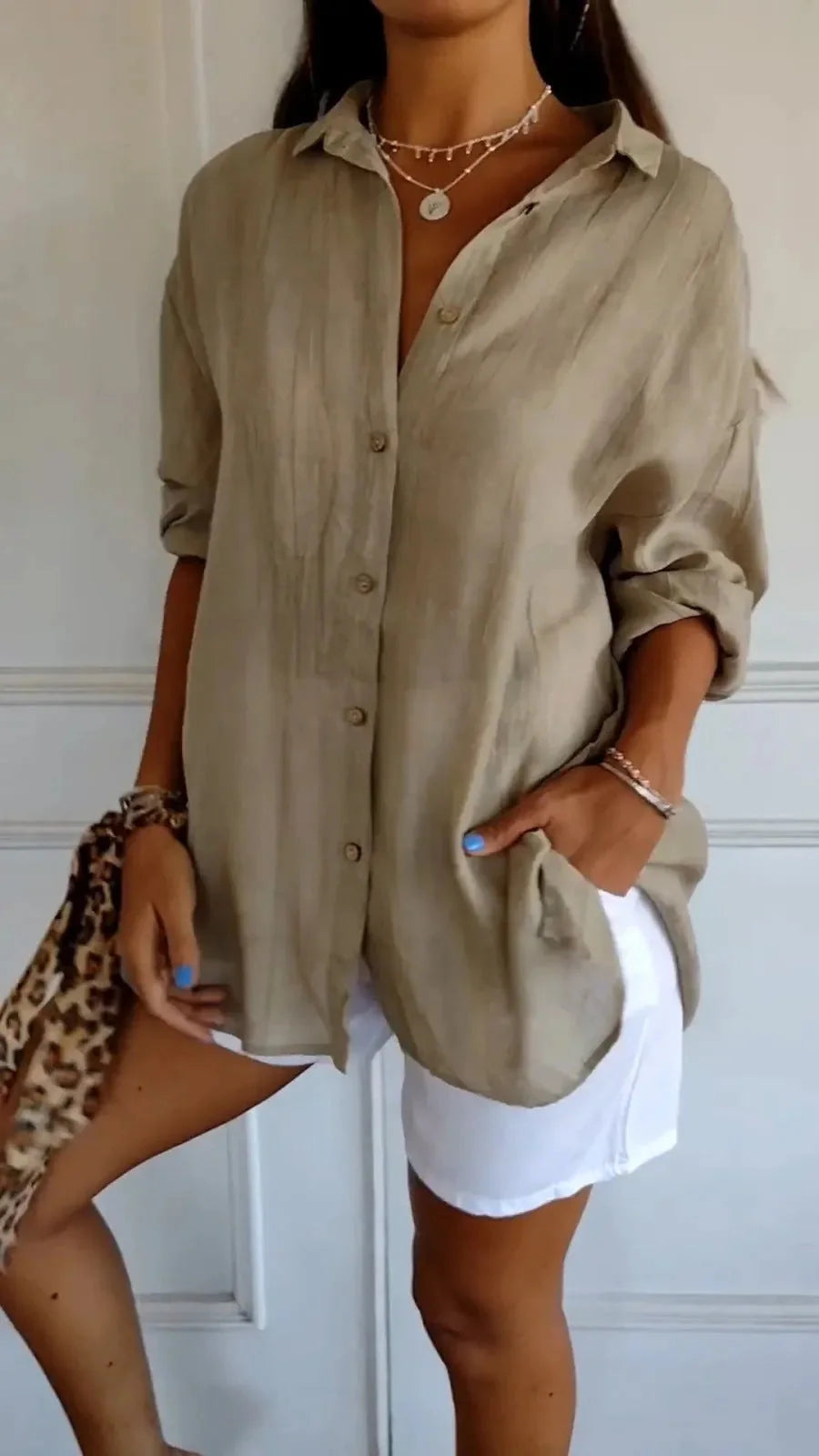 A stylish long-sleeved shirt with a pleated design, available in a variety of colours to suit any occasion.
