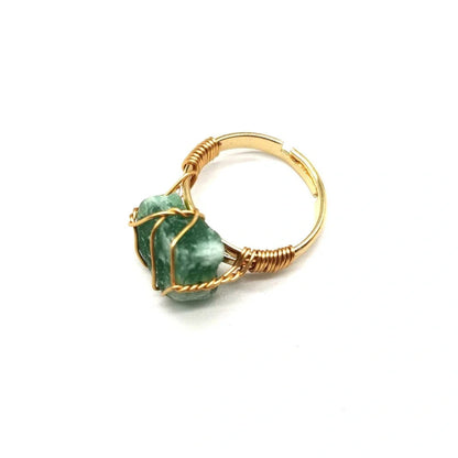 Handcrafted agate stone ring featuring an array of natural gemstones in various colours, with an adjustable design for a customized fit.