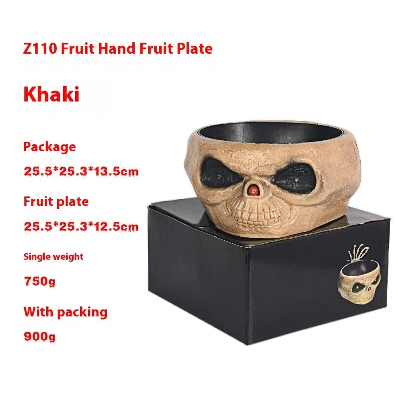 Motion-activated Halloween pumpkin candy bowl with spooky skeleton hand and glowing red eyes