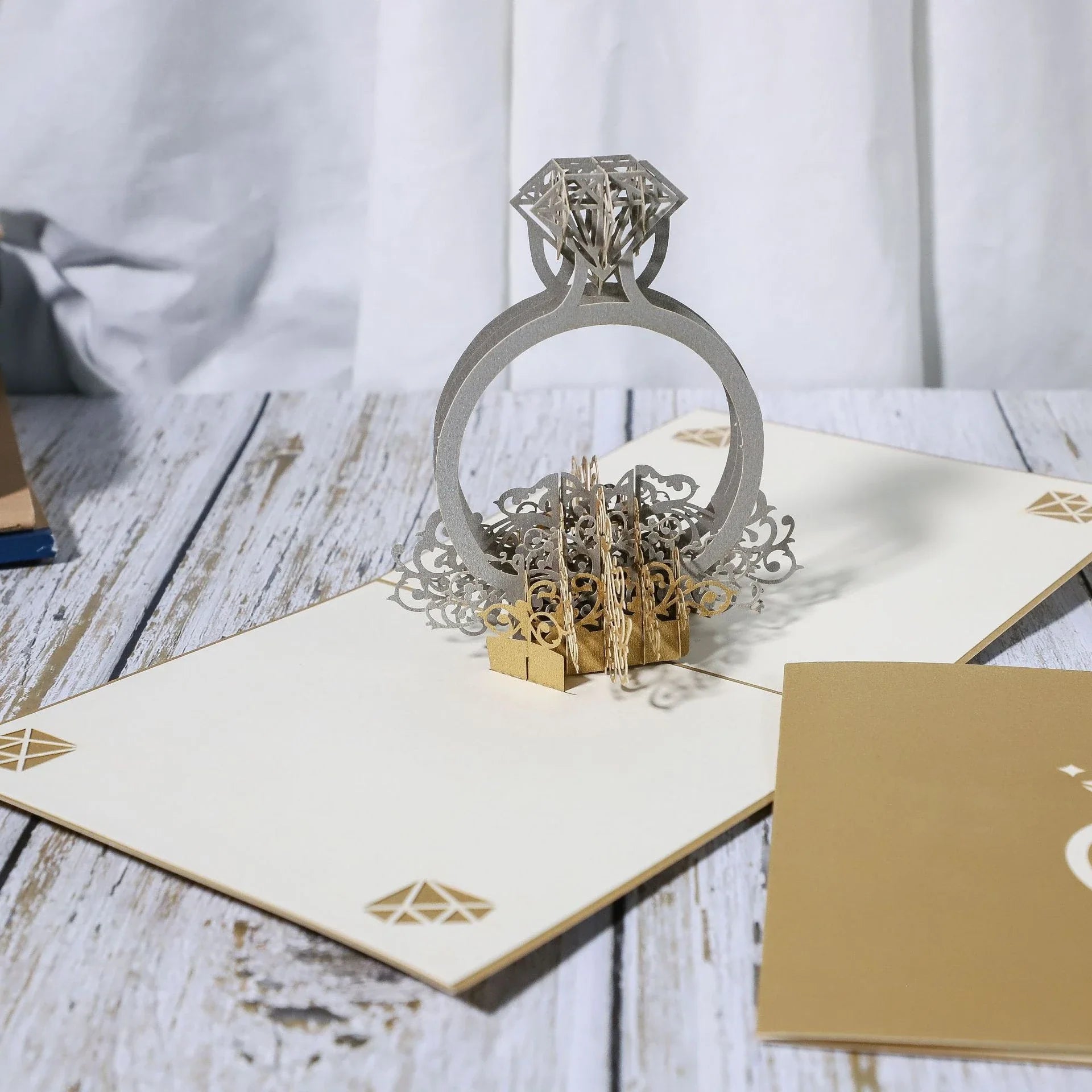 Elegant 3D pop-up wedding and anniversary greeting cards with laser-cut designs in a variety of romantic themes