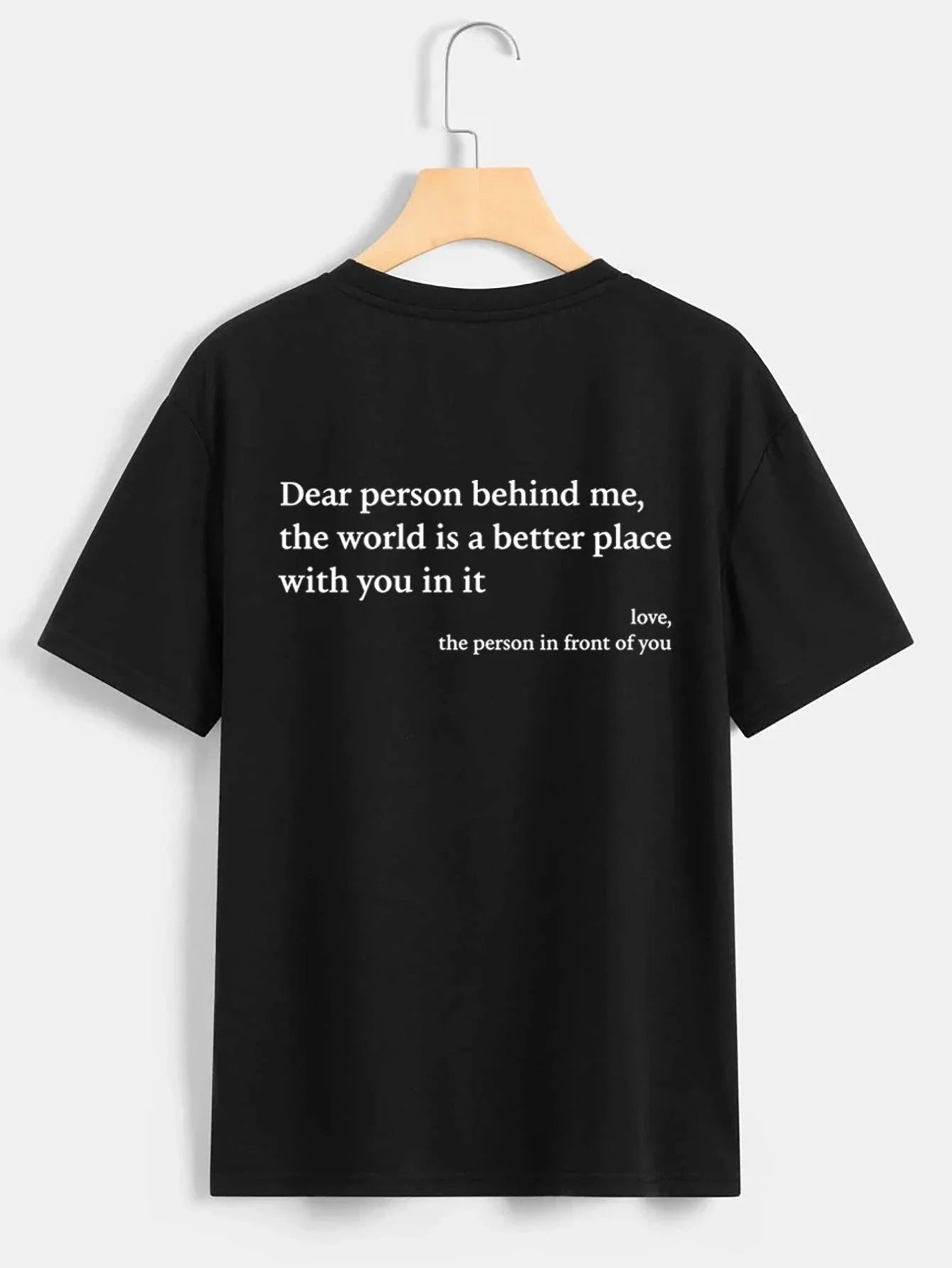 Women's graphic tee with playful slogan, available in various colors and sizes