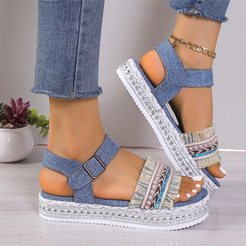Stylish denim tassel sandals for women with thick flat sole, perfect for summer.