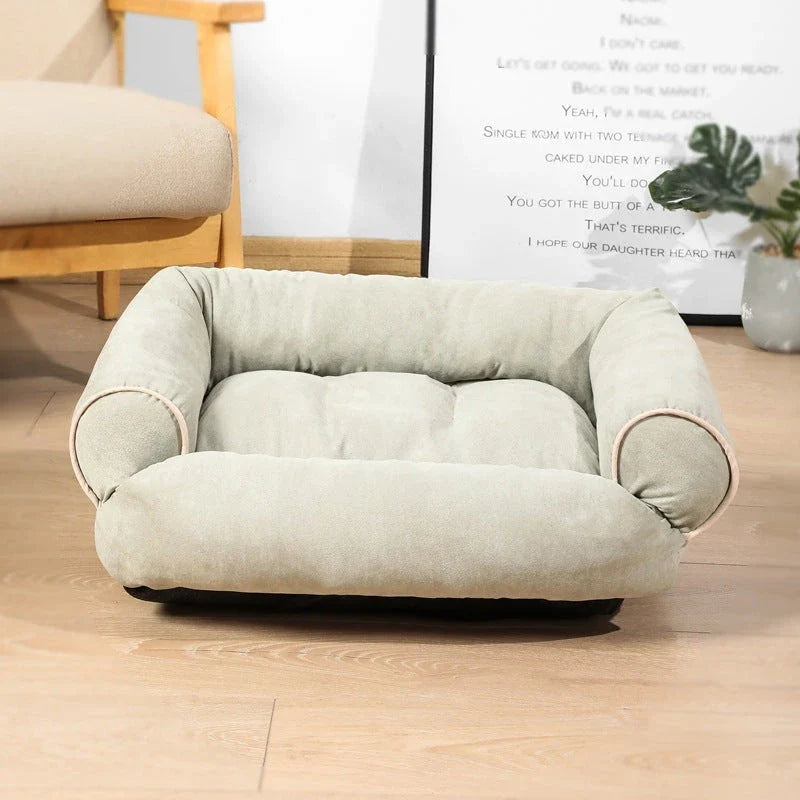 A cosy and plush dog sofa bed with high-elastic PP cotton padding for ultimate comfort and relaxation.