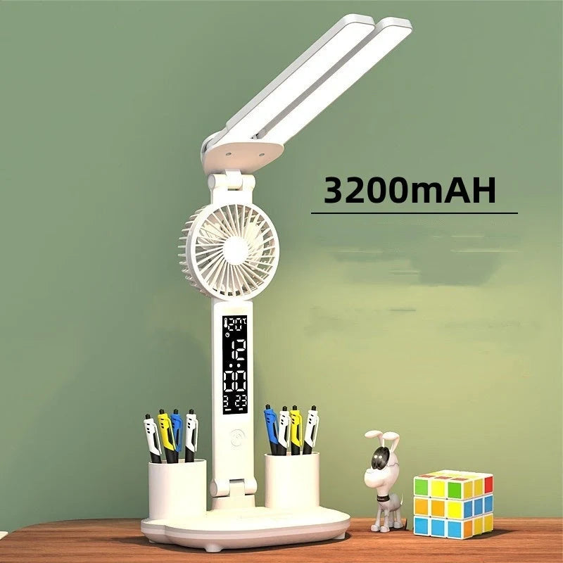 Foldable LED desk lamp with fan, thermometer, and pen holder on a tidy desk