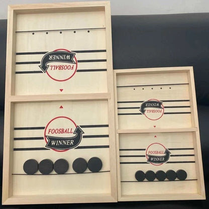 Premium solid wood puck slinging game with smooth playing surface and precision-engineered wooden pucks for interactive family fun