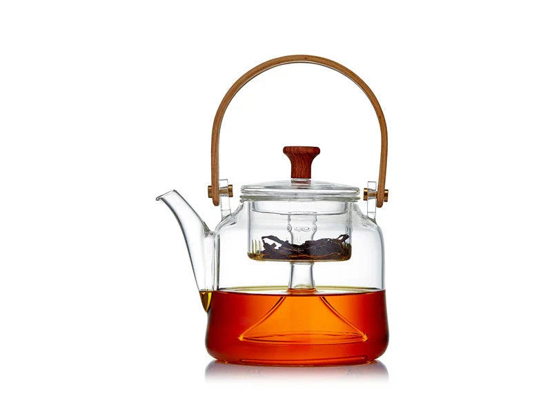 Elegant Japanese-style glass teapot with bamboo handle, perfect for brewing loose-leaf teas