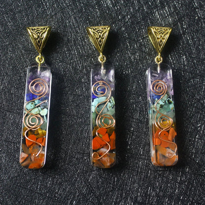 A stunning chakra crystal pendant with natural patterns and organic imperfections, showcasing the beauty of nature.