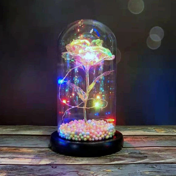 Enchanting artificial rose flower in a glass dome, a timeless home decor piece