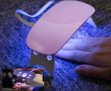 Compact and portable USB-powered nail light therapy machine with adjustable angle and LED light for at-home nail care