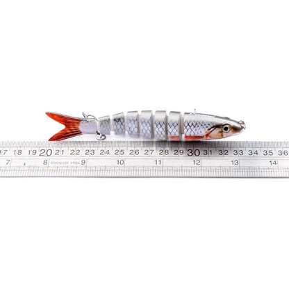 Multi-jointed pike fishing lure with light reflection and sound attraction features
