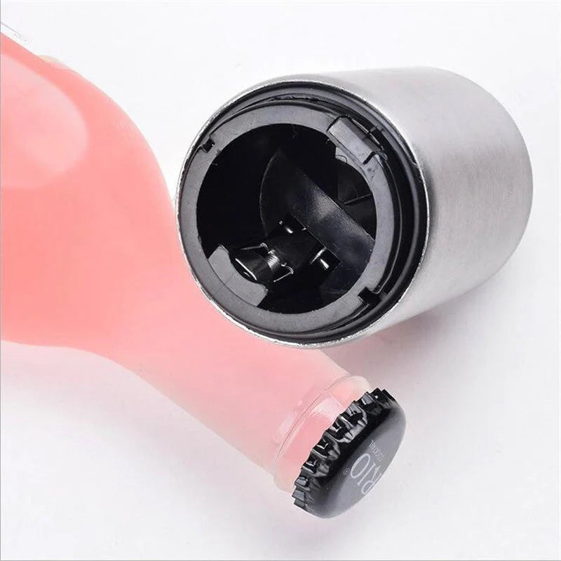 Portable magnetic automatic beer bottle opener in brushed stainless steel finish