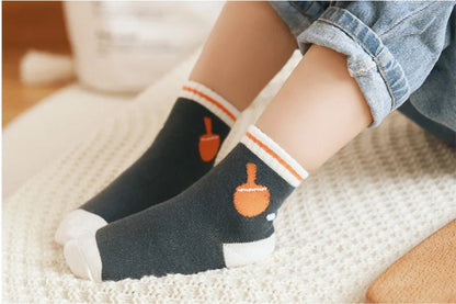 Kids' cartoon jacquard cotton socks in various fun designs for comfort and style