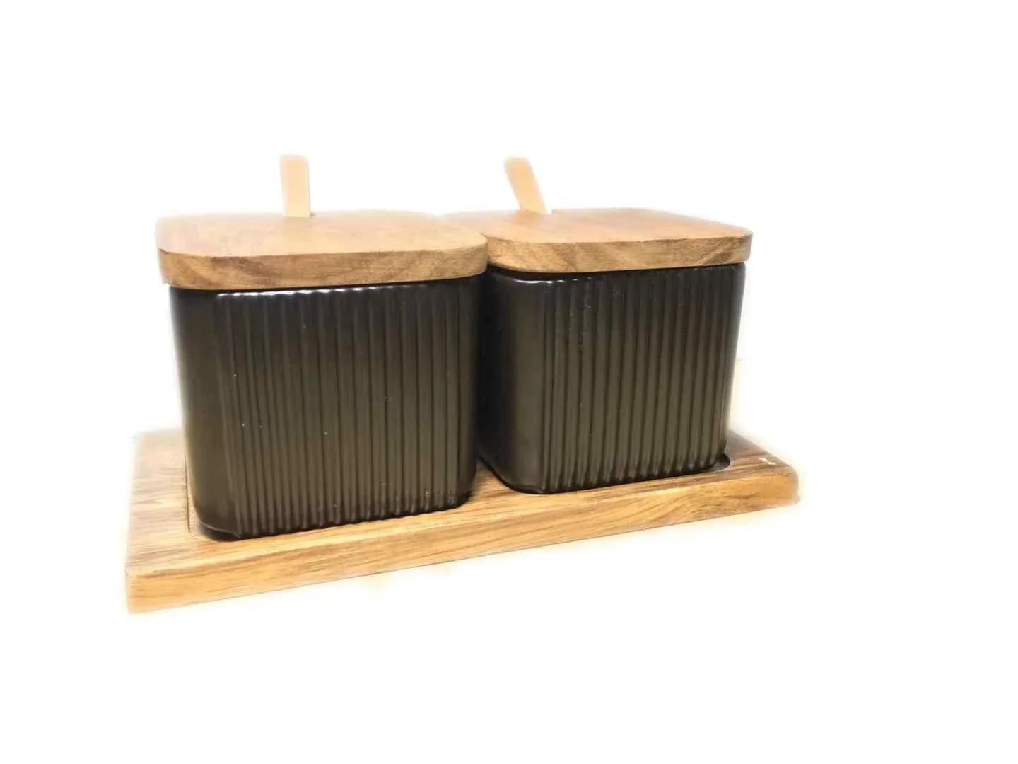 Stylish ceramic seasoning box set with sleek matte finish and airtight lids, perfect for organising spices in a modern British kitchen