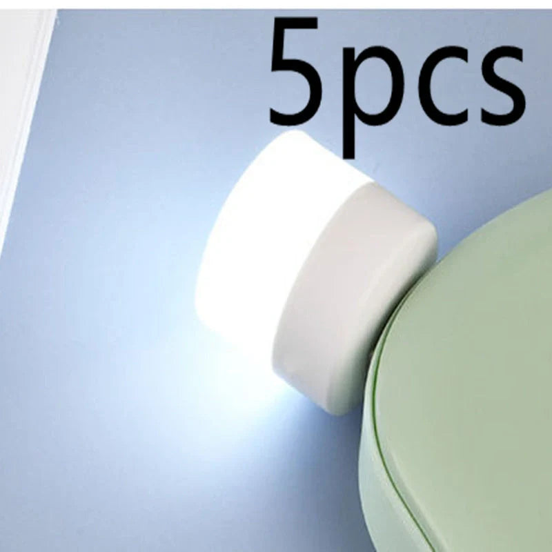 Compact USB LED night light with soft glow for reading and sleep