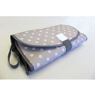 Portable diaper changing pad clutch with built-in toy ring, foldable design for easy transport