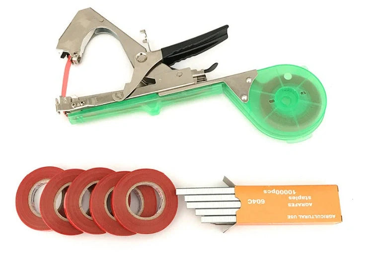 Compact garden hand tool for tying plant stems with plastic tape, measuring 300x200x100mm