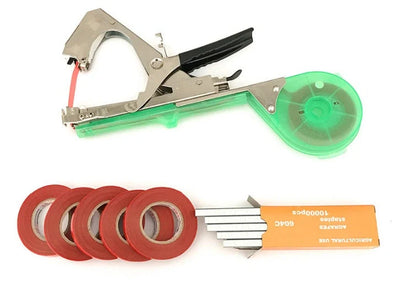 Compact garden hand tool for tying plant stems with plastic tape, measuring 300x200x100mm