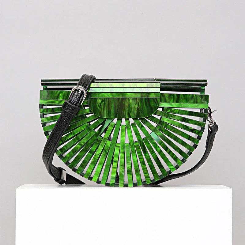 Stylish acrylic cross-body bag in various colors and strap designs, perfect for everyday use and fashion-forward British style.