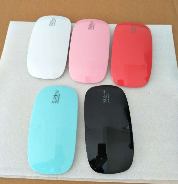 Compact and portable USB-powered nail light therapy machine with adjustable angle and LED light for at-home nail care