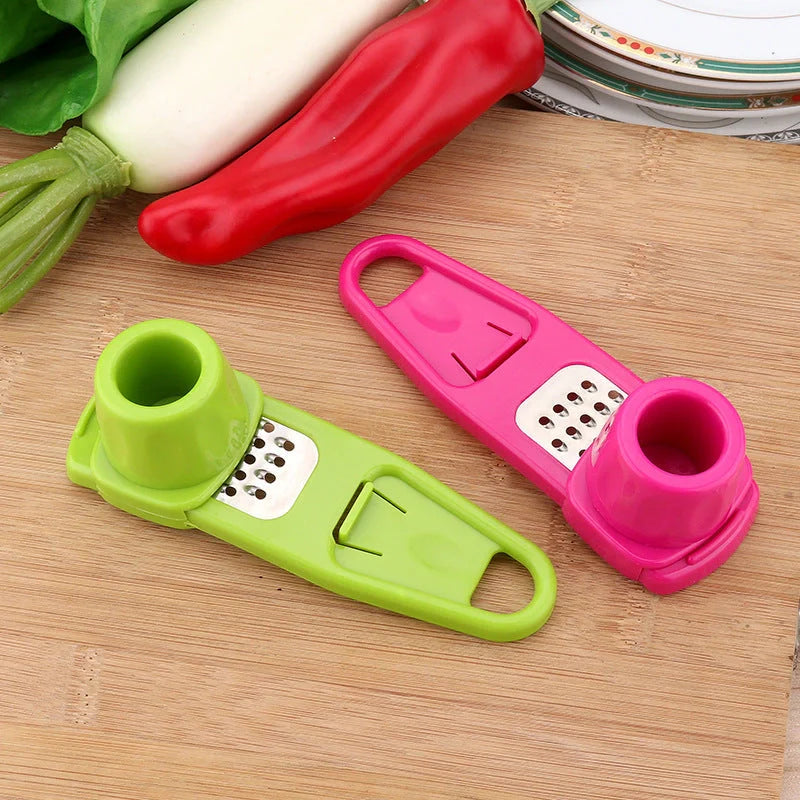 Eco-friendly garlic press and seasoning grinder in rose and green