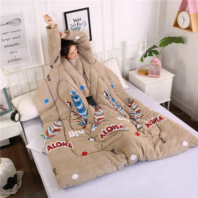 Cozy quilted lounger with sleeves in various colors and sizes, perfect for year-round indoor comfort and relaxation.