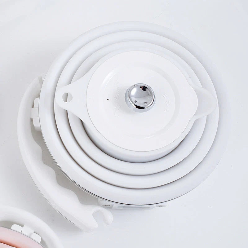 Foldable Electric Kettle in white, blue, and pink with UK, US, and EU plug options