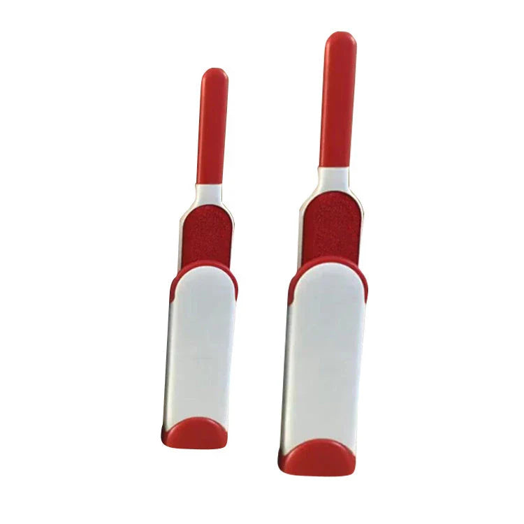 A reusable pet hair remover comb with a self-cleaning base, perfect for removing fur and lint from sofas, chairs, and other upholstery.