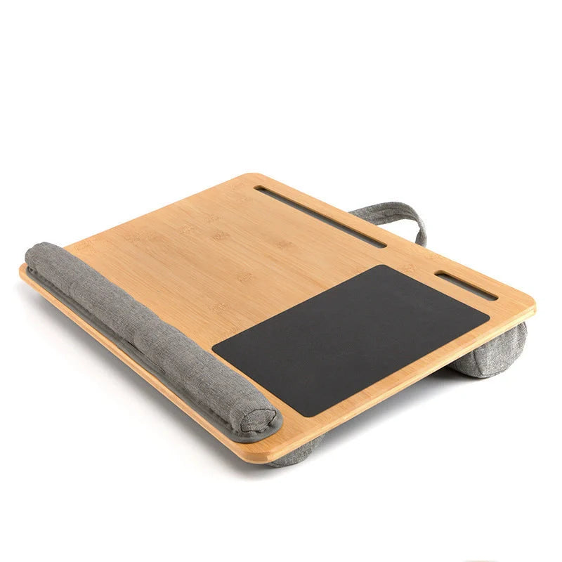 Elegant bamboo lap desk with cushioned surface and card slots for relaxing laptop use
